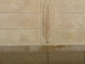 Wall of names of Unknown Soldiers at the American Cemetery.